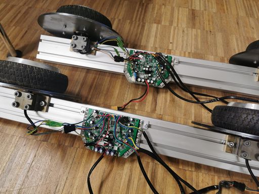 The two aluminium extrusions with motors and electronics mounted