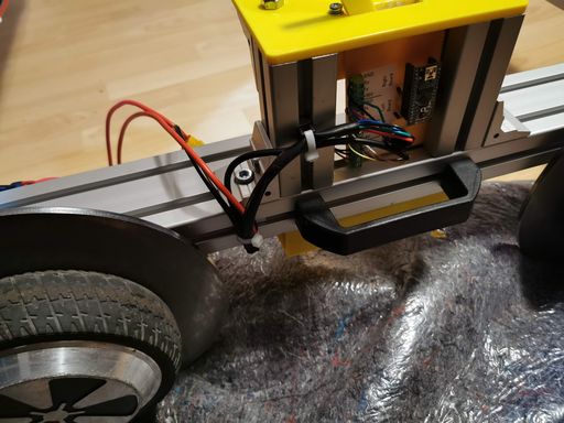 The right side of the kart, showing the control module with an Arduino board