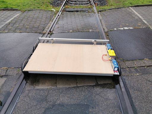 The entire kart, assembled, on a piece of track