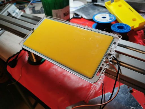 Close-up of the bumper bar with a large COB LED and a badly cut out piece of acrylic on top of it